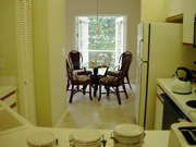 View from kitchen to breakfast area and French doors